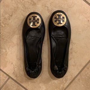 Black Tory Burch Flats with Gold Emblem